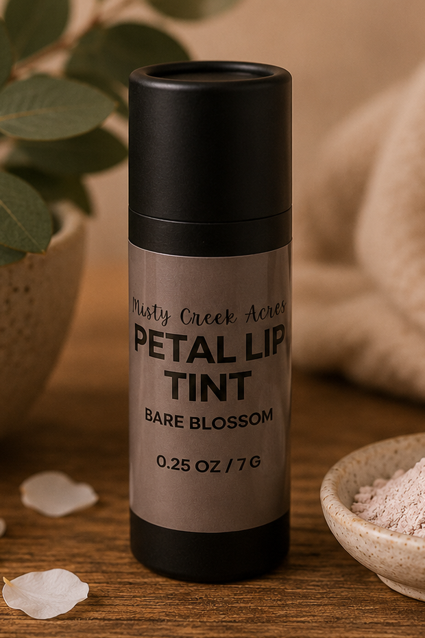 Petal lip tint with natural ingredients on a wooden surface