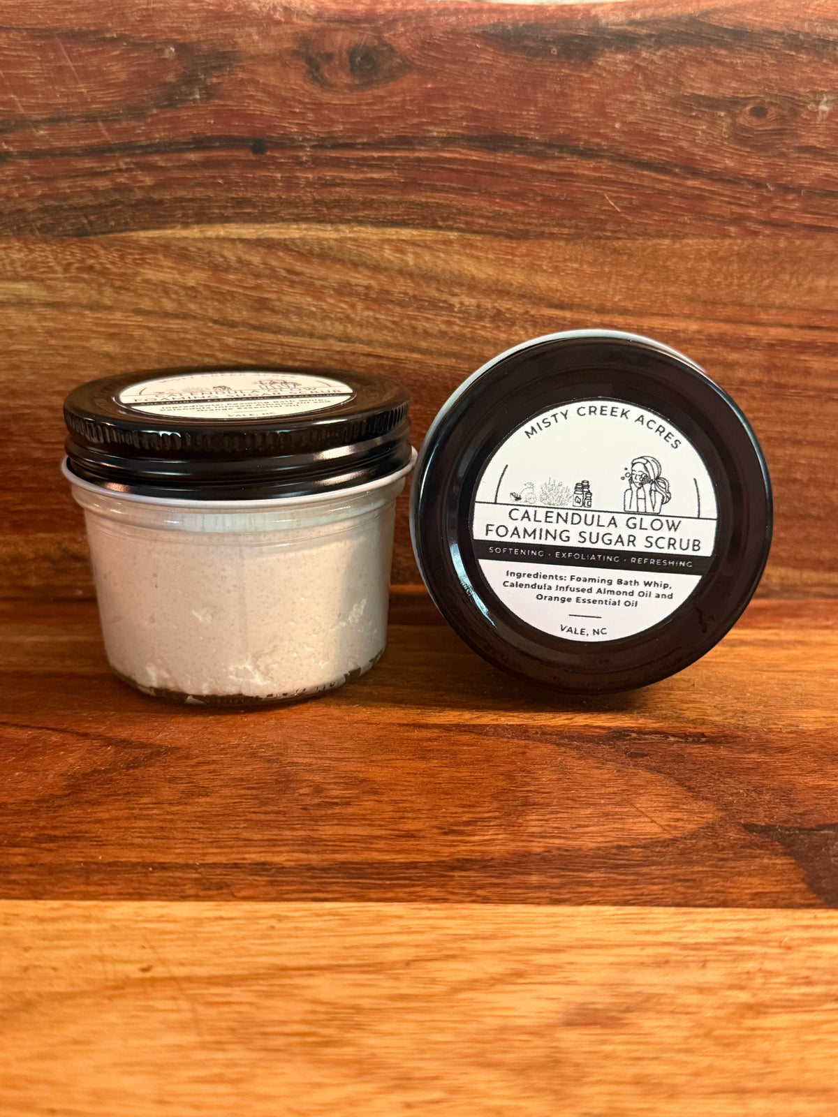 Calendula Glow Foaming Sugar Scrub 4 oz jars on cream background – Misty Creek Acres